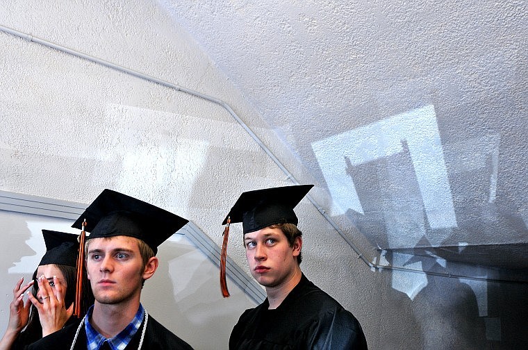 Flathead High Graduating Seniors wait in line in the stairwell before making their way into the gymnasium.