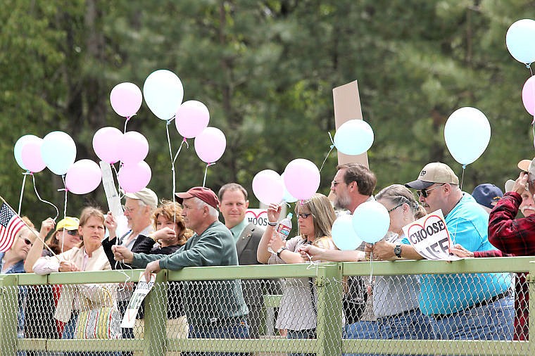 &lt;p&gt;The inaugural Pro-Life Walk and Remembrance Rally in St. Regis began with a potluck and speech at the park and ended at the St. Regis River where a wreath was tossed and balloons were released.&lt;/p&gt;