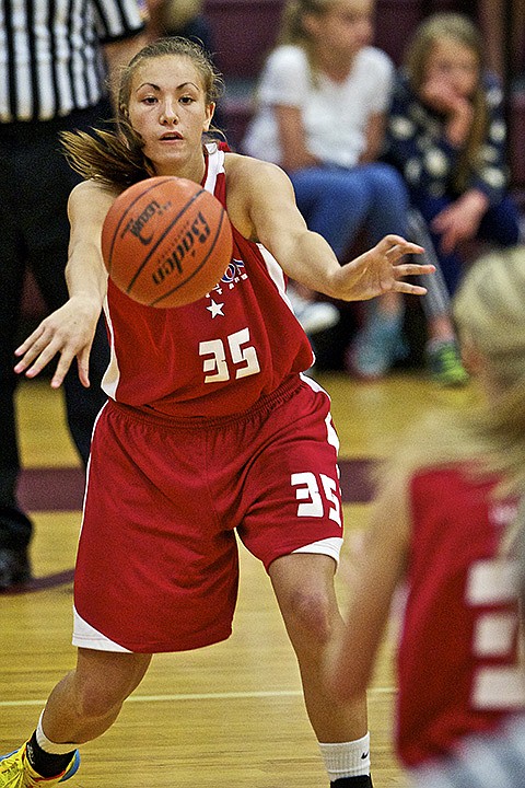 <p>JEROME A. POLLOS/Press Region All-Star Danielle Failor makes a pass to a teammate outside the key during the first half.</p>