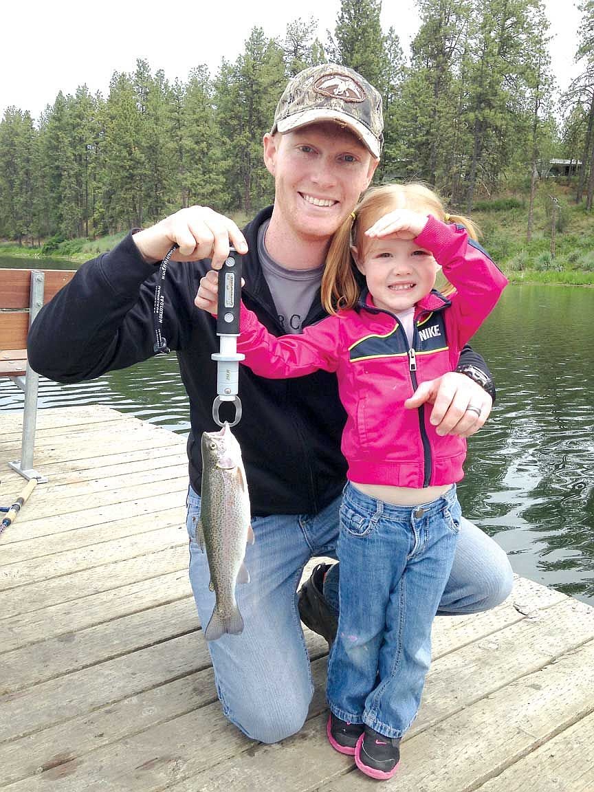 Brinlee Doyle, 3 years old, caught her first fish, a rainbow trout at Clearlake with her dad, Brian Doyle, on May 26. She was using PowerBait to entice the fish. Brian is a staff sergeant and flight engineer with the 36th Rescue Flight.