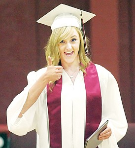 &lt;p&gt;With her tassel positioned to left of her mortar board Hannah Tallmadge gives the thumbs-up sign during Sunday's graduation ceremony at Troy's Activity Center.&lt;/p&gt;