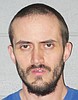 Man charged with breaking into 17 vehicles across the valley