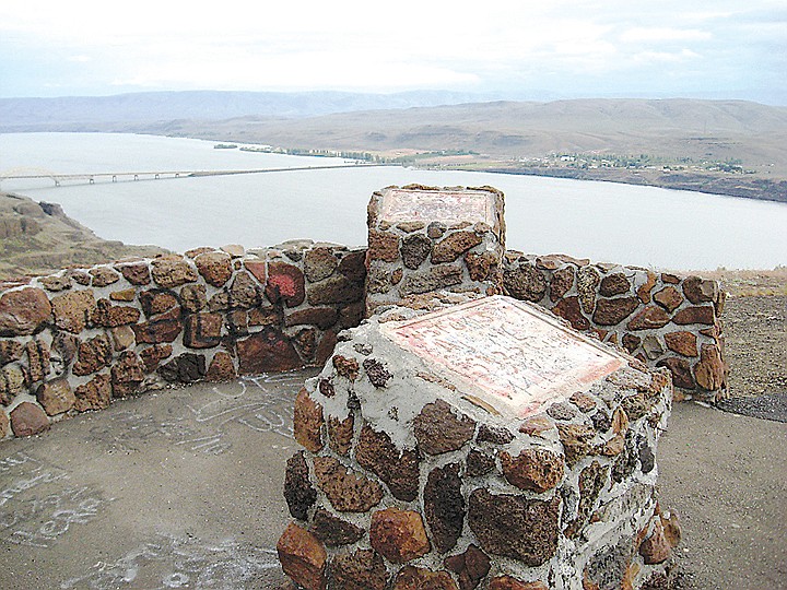 Informational plaques were stolen, above, and the steel horses damaged by graffiti, below, at the sculpture &quot;Grandpa Cut Loose the Ponies,&quot; near Vantage.