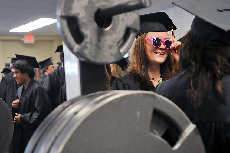 Kayla-Jo Jellar sports a pair of sunglasses before the start of Commencement exercises.