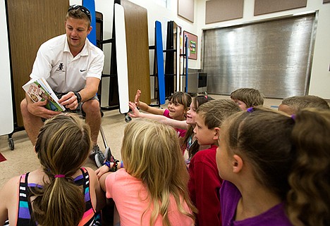 &lt;p&gt;In the 14 years NIC wrestlers and their coaches have been part of the reading program, 13,000 books have been given to young readers.&lt;/p&gt;