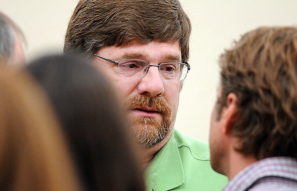 Randy Winter, Justine Winter's father, talks with Jason Thompson during a break in a sentencing hearing for Justine Winter on Monday. Justine Winter was sentenced for the death of Thompson's wife, Erin, in a highway crash two years ago.