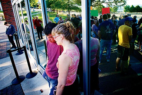 &lt;p&gt;Shane Duffy and Dotty Quade pray outside of the Coeur d'Alene Public Library community room where the city council was listening to public comment Tuesday regarding the non-discrimination regulations ordinance which passed 5-1.&lt;/p&gt;