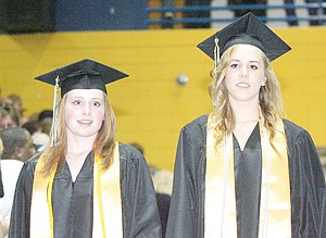 &lt;p&gt;Graduating with honors, Kaitlyn Reintsma, left and Lisa Rios.&lt;/p&gt;