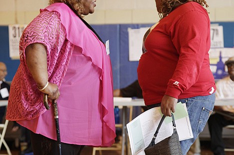 &lt;p&gt;Two overweight women hold a conversation in New York, June 26, 2012.&lt;/p&gt;