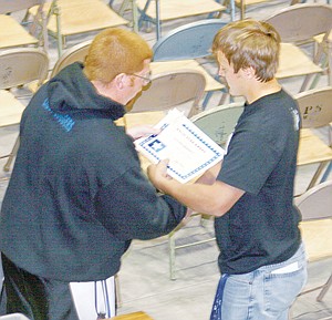 &lt;p&gt;Logger coach Josh Bean presented Dylan Berget with a certificate recognizing him&#160; as the White Star winner for his participation in varsity sports during his four years at Libby High School. Berget won 14 varsity letters during his four years at the school, competing nearly every season and playing football in the fall while running cross-country, too.&lt;/p&gt;
