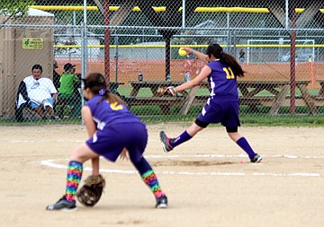 &lt;p&gt;Photo by Jessica Stugelmayer. Rhiley Big Beaver launches a pitch while Kyla Blixt waits at first.&lt;/p&gt;