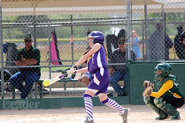 &lt;p&gt;Photo by Jessica Stugelmayer. Jazmine Spotted Bear takes a swing at a low pitch from the Great Falls Selects.&lt;/p&gt;