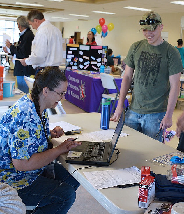 &lt;p&gt;&lt;strong&gt;Left to right, Tammy Matt, Community Health Director and organizer of the event, signs in Wade Burland, a college student recently honorably discharged from the military.&lt;/strong&gt;&lt;/p&gt;&lt;p&gt;&lt;strong&gt;&#160;&lt;/strong&gt;&lt;/p&gt;