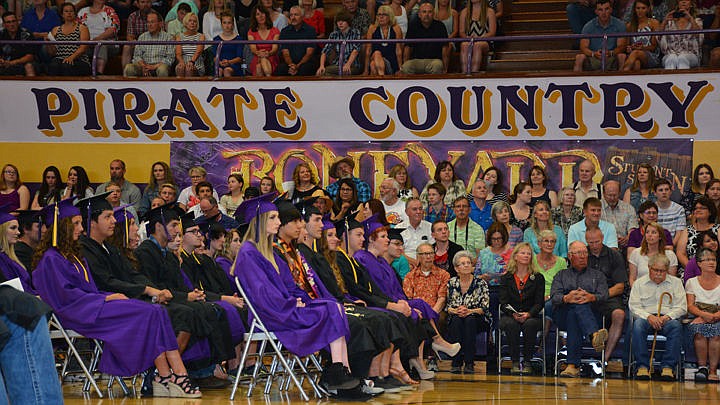 &lt;p&gt;A part of the Polson High School graduating class sits along side parents and supporters.&lt;/p&gt;