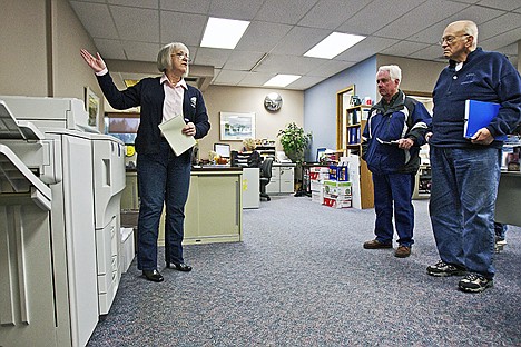 &lt;p&gt;Susan Weathers, the Coeur d'Alene city clerk, explains to Frank Orzell, right, and Bill McCrory the process of how recall petitions will be digitized and where the files will be stored when they are received.&lt;/p&gt;