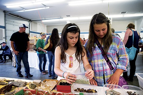 &lt;p&gt;Cassie Skelton, 10, and Joselenia Kopets, 11, examine rocks at North Idaho Mineral Club&Otilde;s Gem and Rock Show on Saturday afternoon. Skelton has a collection of over 100 rocks.&lt;/p&gt;