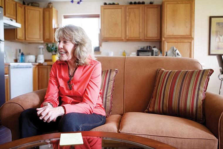 &lt;p&gt;At her home in Kalispell, Judi Fenton smiles Monday afternoon while talking about traveling the world as an international education consultant. May 20, 2013 in Kalispell, Montana. (Patrick Cote/Daily Inter Lake)&lt;/p&gt;