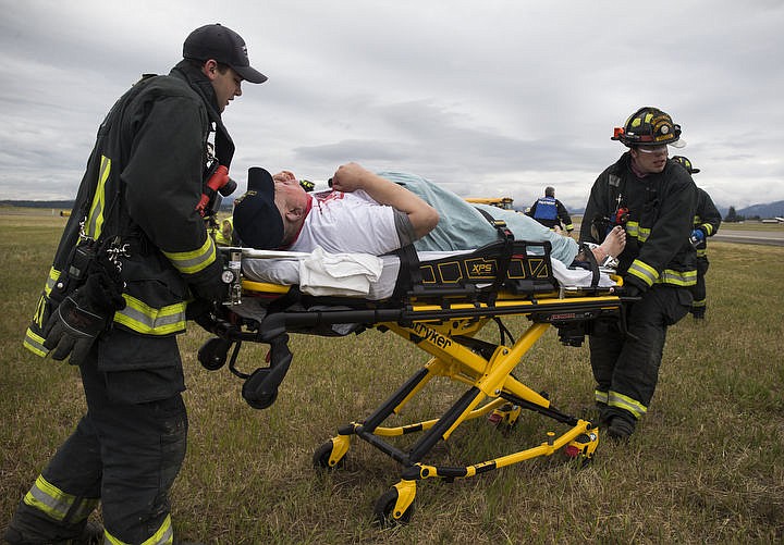 &lt;p&gt;LOREN BENOIT/Press As part of the Cascadia Rising training scenario, more than 70 first responders participated in a training exercise for a two-plane crash on Friday, June 10, 2016 at the Coeur d'Alene Airport. To make the scenario realistic, 24 volunteers acted as victims of the crash, and first responders had to assess and treat the victims on-scene as they would in a real crash. To purchase photo, please visit cdapress.com/photos&lt;/p&gt;