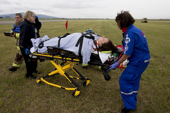 &lt;p&gt;As part of the Cascadia Rising training scenario, more than 70 first responders participated in a training exercise for a two-plane crash on Friday, June 10, 2016 at the Coeur d'Alene Airport. To make the scenario realistic, 24 volunteers acted as victims of the crash, and first responders had to assess and treat the victims on-scene as they would in a real crash. To purchase photo, please visit cdapress.com/photos&lt;/p&gt;