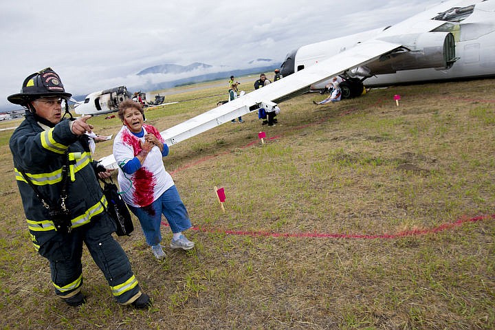 &lt;p&gt;As part of the Cascadia Rising training scenario, more than 70 first responders participated in a training exercise for a two-plane crash on Friday, June 10, 2016 at the Coeur d'Alene Airport. To make the scenario realistic, 24 volunteers acted as victims of the crash, and first responders had to assess and treat the victims on-scene as they would in a real crash. To purchase photo, please visit cdapress.com/photos&lt;/p&gt;