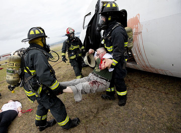 &lt;p&gt;As part of the Cascadia Rising training scenario, more than 70 first responders participated in a training exercise for a two-plane crash on Friday, June 10, 2016 at the Coeur d'Alene Airport. To make the scenario realistic, 24 volunteers acted as victims of the crash, and first responders had to assess and treat the victims on-scene as they would in a real crash. To purchase photo, please visit cdapress.com/photos&lt;/p&gt;