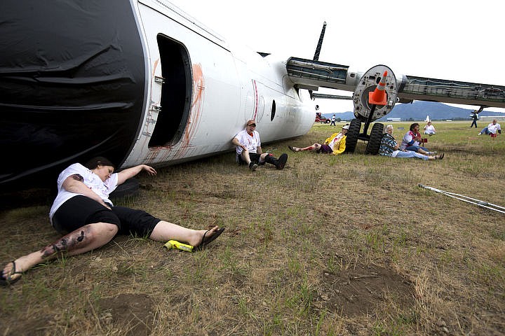 &lt;p&gt;As part of the Cascadia Rising training scenario, more than 70 first responders participated in a training exercise for a two-plane crash on Friday, June 10, 2016 at the Coeur d'Alene Airport. To make the scenario realistic, 24 volunteers acted as victims of the crash, and first responders had to assess and treat the victims on-scene as they would in a real crash. To purchase photo, please visit cdapress.com/photos&lt;/p&gt;