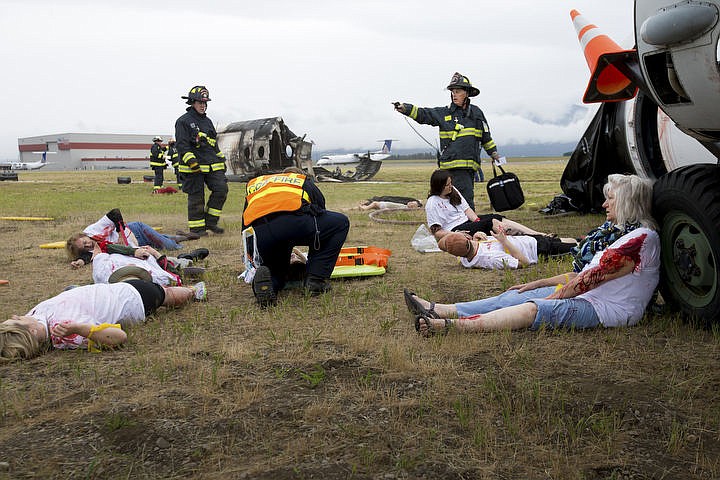 &lt;p&gt;As part of the Cascadia Rising training scenario, more than 70 first responders participated in a training exercise for a two-plane crash on Friday, June 10, 2016 at the Coeur d'Alene Airport. To make the scenario realistic, 24 volunteers acted as victims of the crash, and first responders had to assess and treat the victims on-scene as they would in a real crash. To purchase photo, please visit cdapress.com/photos&lt;/p&gt;