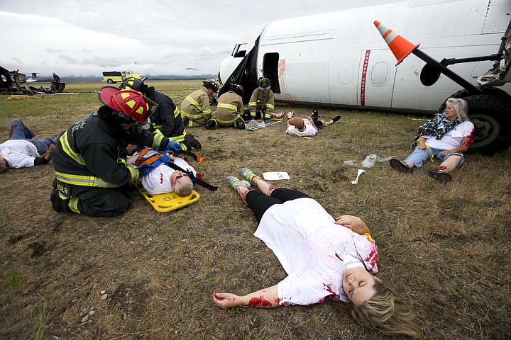 &lt;p&gt;As part of the Cascadia Rising training scenario, more than 70 first responders participated in a training exercise for a two-plane crash on Friday, June 10, 2016 at the Coeur d'Alene Airport. To make the scenario realistic, 24 volunteers acted as victims of the crash, and first responders had to assess and treat the victims on-scene as they would in a real crash. To purchase photo, please visit cdapress.com/photos&lt;/p&gt;