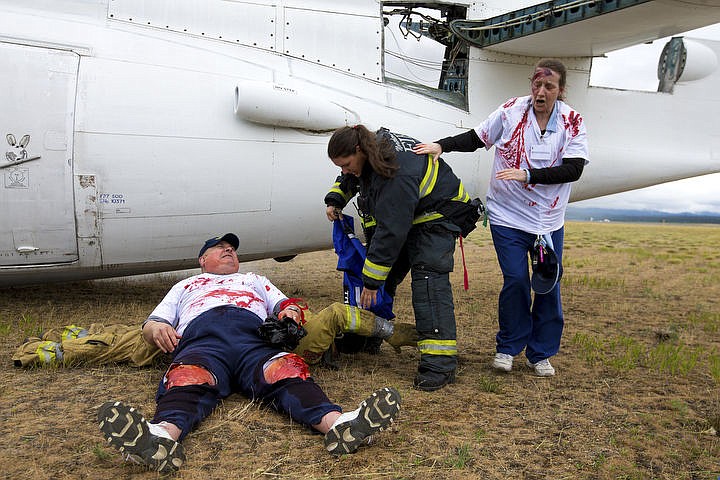 &lt;p&gt;As part of the Cascadia Rising training scenario, more than 70 first responders participated in a training exercise for a two-plane crash on Friday, June 10, 2016 at the Coeur d'Alene Airport. To make the scenario realistic, 24 volunteers acted as victims of the crash, and first responders had to assess and treat the victims on-scene as they would in a real crash. To purchase photo, please visit cdapress.com/photos&lt;/p&gt;