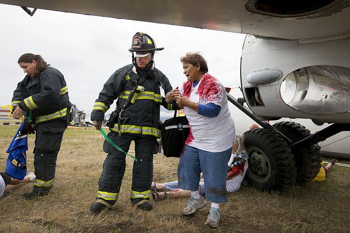 &lt;p&gt;As part of the Cascadia Rising training scenario, more than 70 first responders participated in a training exercise for a two-plane crash on Friday, June 10, 2016 at the Coeur d'Alene Airport. To make the scenario realistic, 24 volunteers acted as victims of the crash, and first responders had to assess and treat the victims on-scene as they would in a real crash. To purchase photo, please visit cdapress.com/photos&lt;/p&gt;