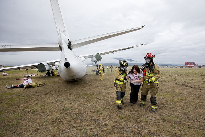 &lt;p&gt;As part of the Cascadia Rising training scenario, more than 70 first responders participated in a training exercise for a two-plane crash on Friday, June 10, 2016 at the Coeur d'Alene Airport. To make the scenario realistic, 24 volunteers acted as victims of the crash, and first responders had to assess and treat the victims on-scene as they would in a real crash. To purchase photo, please visit cdapress.com/photos&lt;/p&gt;