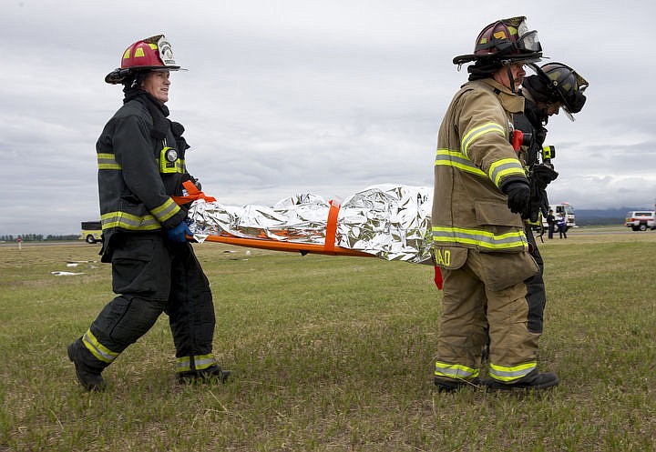 &lt;p&gt;As part of the Cascadia Rising training scenario, more than 70 first responders participated in a training exercise for a two-plane crash on Friday, June 10, 2016 at the Coeur d'Alene Airport. To make the scenario realistic, 24 volunteers acted as victims of the crash, and first responders had to assess and treat the victims on-scene as they would in a real crash. To purchase photo, please visit cdapress.com/photos&lt;/p&gt;