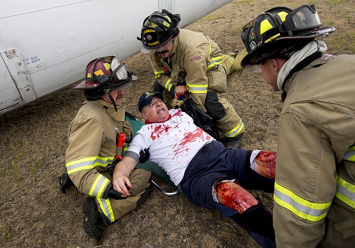 &lt;p&gt;As part of the Cascadia Rising training scenario, more than 70 first responders participated in a training exercise for a two-plane crash on Friday, June 10, 2016 at the Coeur d'Alene Airport. To make the scenario realistic, 24 volunteers acted as victims of the crash, and first responders had to assess and treat the victims on-scene as they would in a real crash. To purchase photo, please visit cdapress.com/photos&lt;/p&gt;