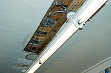 SMS roof leaks cause building damage