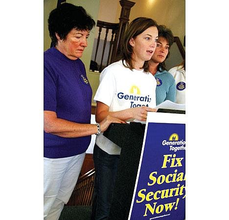 Kala French, 20, stands between her grandmother Kathy Ingram, 62, left, and her mother Debby French, 42, as she speaks about Social Security change in Kalispell on Tuesday afternoon. French and her family are working with a group called Generations Together to promote private Social Security accounts.