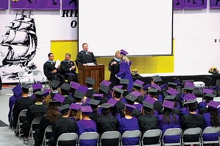 Patient Polson grads wait their turn to go onstage during the 2010 ceremony last Saturday.