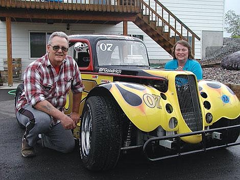 Mike and Nancy Thoenness, both of Kalispell, were instrumental in restarting the auto racing Hall of Fame after a four-year break. The two have been very active on the organizational and racing levels in the Flathead Valley. They are pictured with a Flathead Legend race car, which is owned and driven by John Logan.&lt;br&gt;David Lesnick/Daily Inter Lake