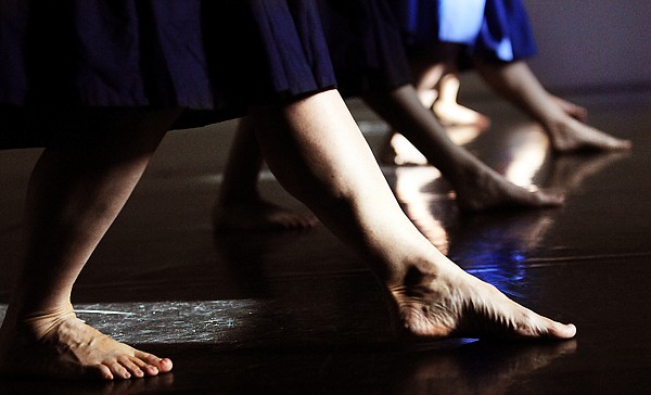 Detail of a dancer's feet as students from the Hula School of the Peaceful, Heavenly, Flowing Waters perform during dress rehearsal on Tuesday in Kalispell.