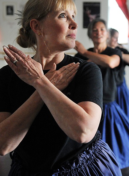 Terri Fehlhaber of Kalispell and members of the Hula School of the Peaceful, Heavenly, Flowing Waters perform during dress rehearsal on Tuesday in Kalispell. The dancers will be taking part in HULA HO`IKE 2010 tomorrow at Glacier High School at 3 p.m.