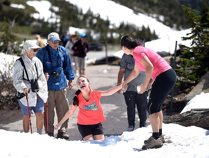 &lt;p&gt;Valeria Gordan and her 10-year-old daughter Julia, originally from Brazil but currently living in Florida, play in the snow at Logan Pass as they make their first trip to Glacier National Park on Thursday, June 11. Going-to-the-Sun Road opened to Logan Pass that morning. (Brenda Ahearn/Daily Inter Lake)&lt;/p&gt;