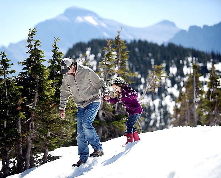 &lt;p&gt;&lt;strong&gt;Matt Gilley&lt;/strong&gt; of San Antonio, Texas, and his daughter Marie, 4, trek through the snow at Logan Pass on Thursday in Glacier National Park. (Brenda Ahearn/Daily Inter Lake)&lt;/p&gt;