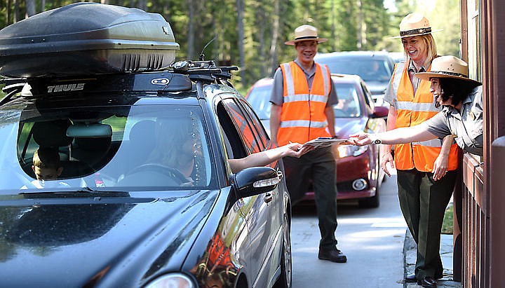 &lt;p&gt;&lt;strong&gt;Becky Janssen&lt;/strong&gt; and her children Pierce, 14, and Gretchen, 10, are greeted by Glacier National Park employees at the West Glacier entrance station. Janssen was selected to represent the 100 millionth visitor to Glacier National Park on Thursday. (Brenda Ahearn/Daily Inter Lake)&lt;/p&gt;