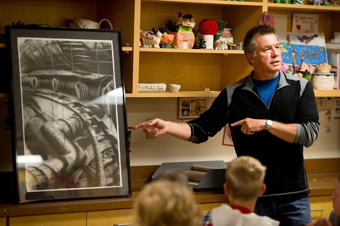 &lt;p&gt;JAKE PARRISH/Press Hayden Lake artist Michael Horswill talks about the process behind creating his charcoal on paper piece, &quot;Boundaries,&quot; on Friday at Sorenson Magnet School of the Arts and Humanities. For the second year in a row, the fifth-graders at Sorenson chose a Horswill piece to be donated to the school, where it will be permenately displayed.&lt;/p&gt;