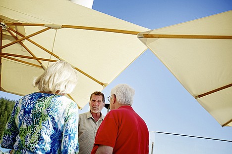 &lt;p&gt;Brad Corkhill, a North Idaho Political Action Committee board member, talks with attendees at a NIPAC event Monday at The Coeur d'Alene Resort.&lt;/p&gt;