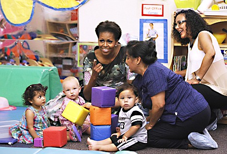 &lt;p&gt;First lady Michelle Obama visits CentroNia, a bilingual child care facility in Washington, Wednesday, where she announced Let's Move! Child Care, an effort to raise healthy eating and living for young children.&lt;/p&gt;