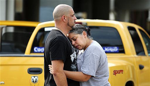 &lt;p&gt;Ray Rivera, left, a DJ at Pulse Orlando nightclub, is consoled by a friend, outside of the Orlando Police Department after a shooting involving multiple fatalities at the nightclub, Sunday, June 12, 2016, in Orlando, Fla. (Joe Burbank/Orlando Sentinel via AP)&#160;&lt;/p&gt;