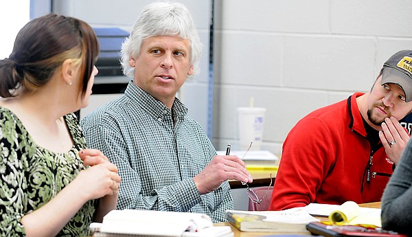 Pat Reilly speaks with fellow students in class at Flathead Valley Community College on April 20.