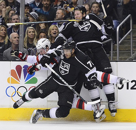 &lt;p&gt;New Jersey Devils center Ryan Carter (20) collides with Los Angeles Kings center Jordan Nolan (71) and Los Angeles Kings defenseman Matt Greene (2) in the first period during Game 6 of the NHL hockey Stanley Cup finals,Monday, June 11, 2012, in Los Angeles. (AP Photo/Mark J. Terrill)&lt;/p&gt;