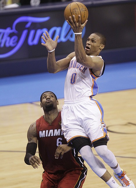 &lt;p&gt;Oklahoma City Thunder point guard Russell Westbrook shoots over Miami Heat small forward LeBron James during the second half at Game 1 of the NBA finals basketball series, Tuesday, June 12, 2012, in Oklahoma City. (AP Photo/Sue Ogrocki)&lt;/p&gt;