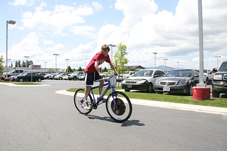 &lt;p&gt;Cooper Haney, 12, takes a test drive at Parker Toyota Scion on Sunday. &quot;It rides good,&quot; he said.&lt;/p&gt;